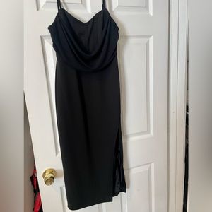 Black dress, corset look on the top of dress